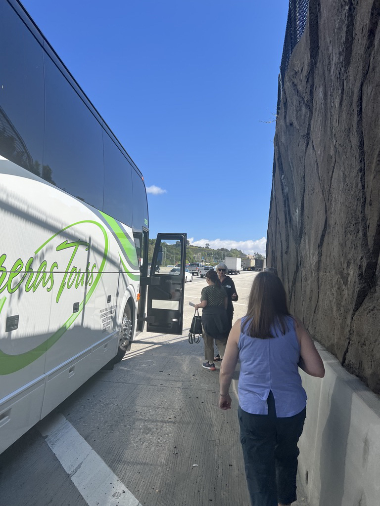 Walking to a new bus after the radiator broke on the 405