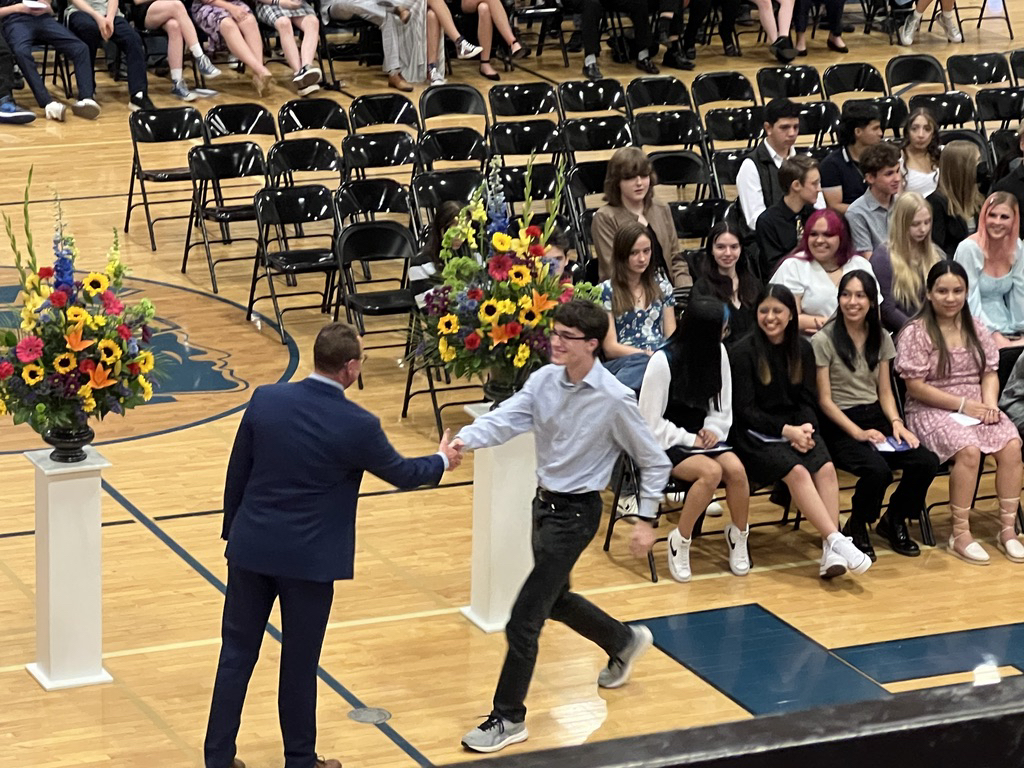 Shaking the Assistant Principal's hand