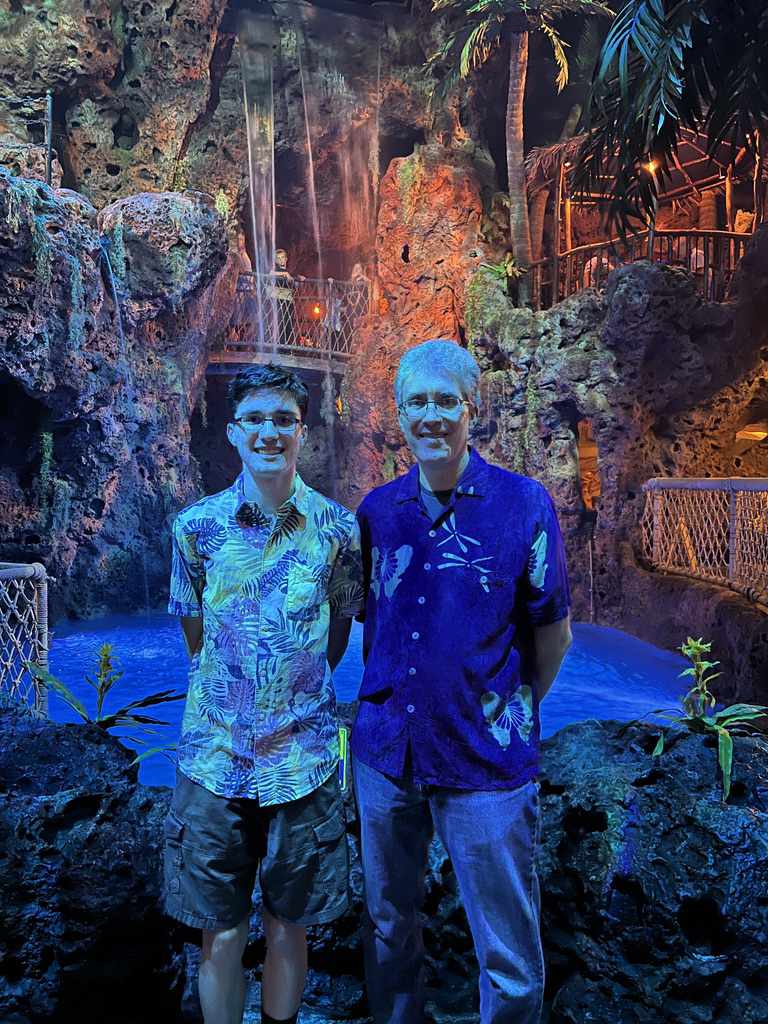 In front of the waterfall and diving pool