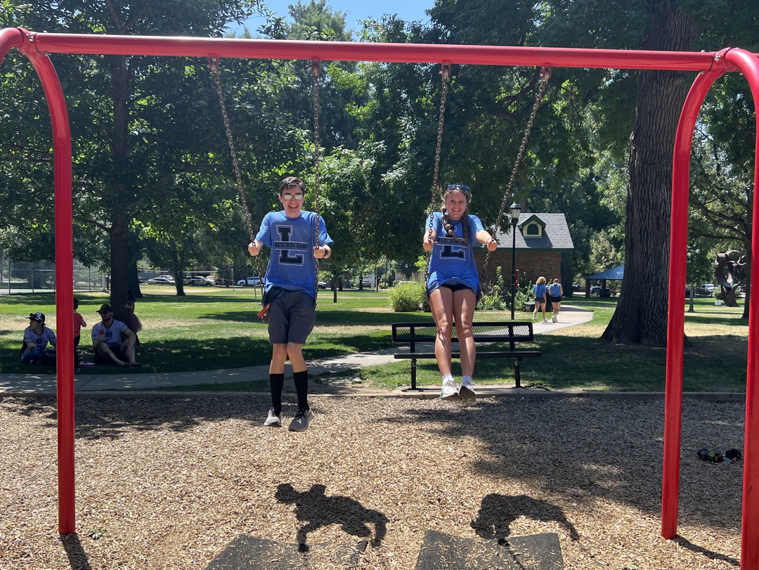 Two flutes enjoying the swings