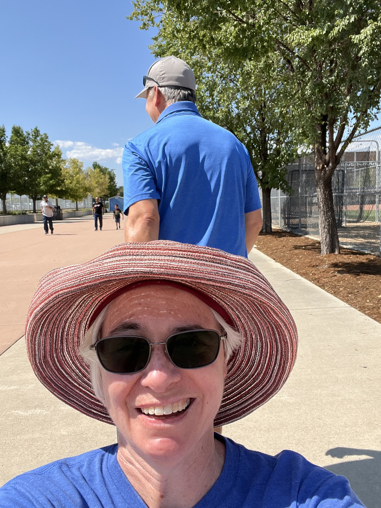 Getting a ride on a dolly while helping marching band
