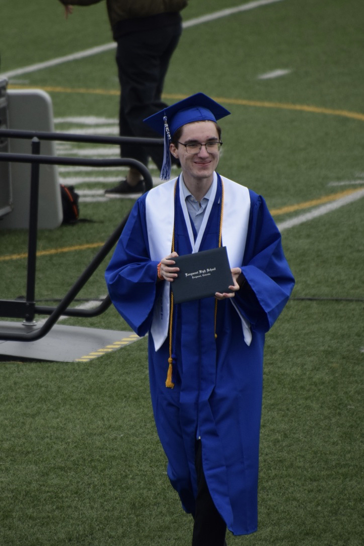 Smiling at his teachers