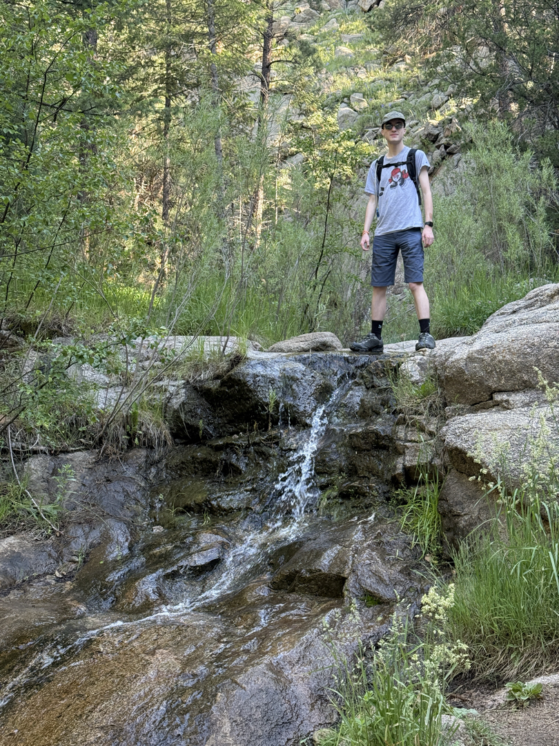 Breaking in his new hiking boots before college