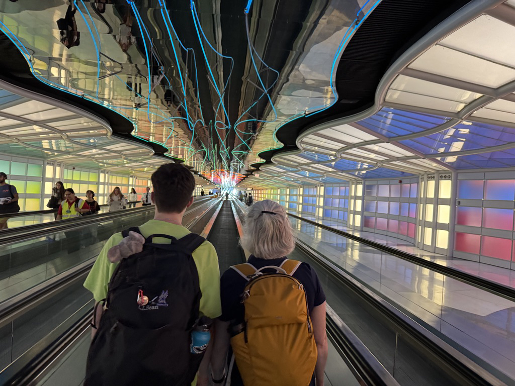 Ted, Lisa and Muppy in the Chicago airport tunnel of lights