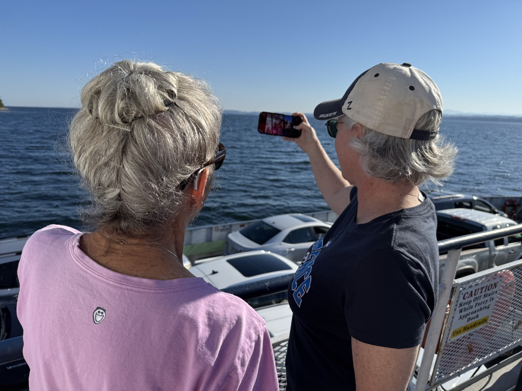 A picture of us taking a picture on the ferry to VT