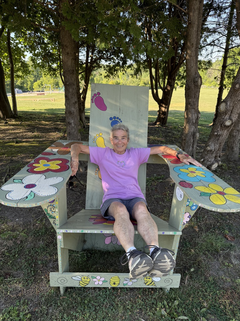 In a big Adirondack chair